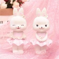 Tirelire en forme de fleur avec lapin