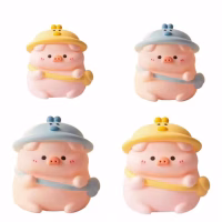 Tirelire cochon avec bonnet