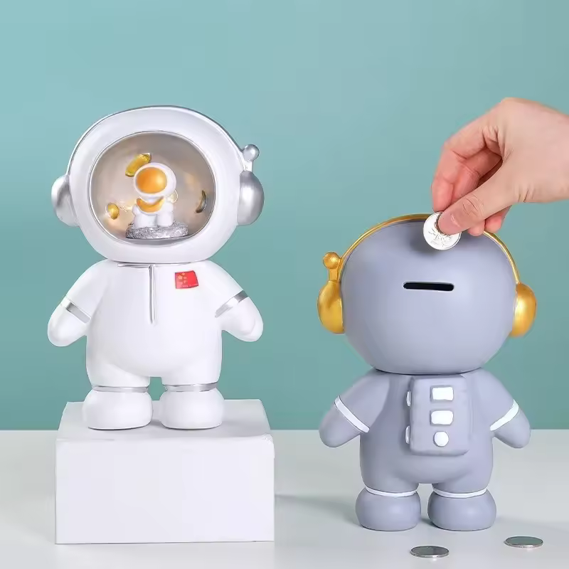 Tirelire astronaute grise