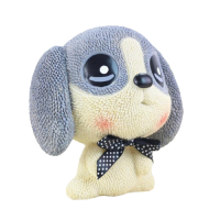 tirelire figurine ruban